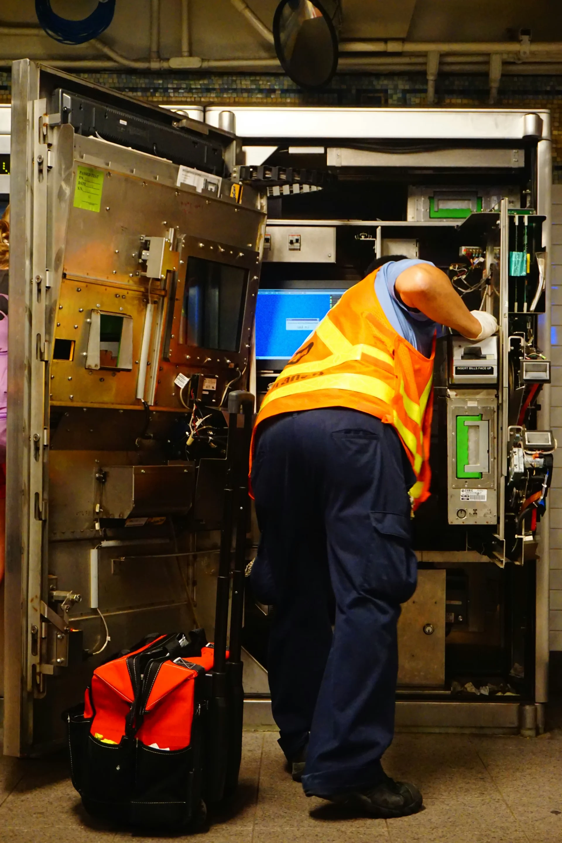 pouch operator checking motor temperature with