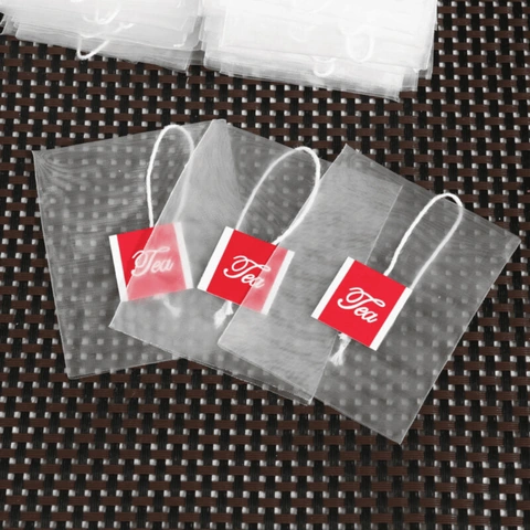Flat filter tea bag with envelope